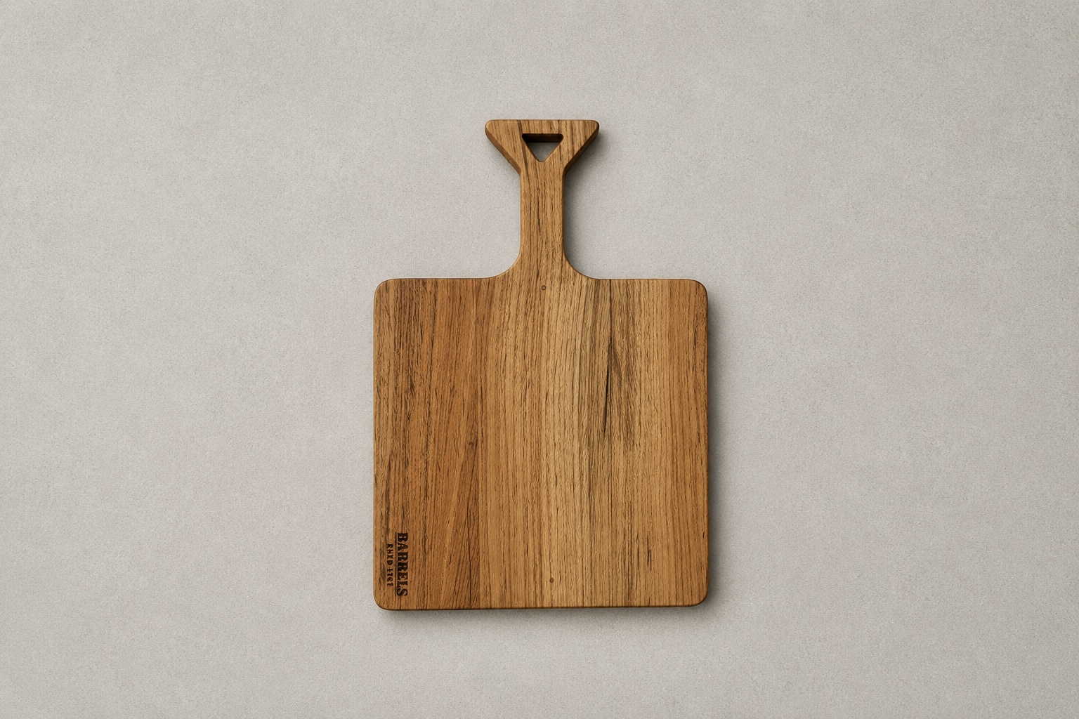 Wooden serving board with pointed handle